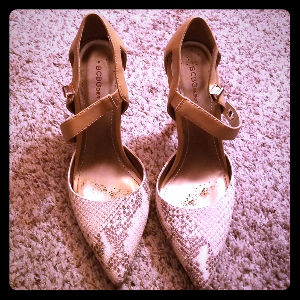 BCBG pointed toe stilettos with unique strap!